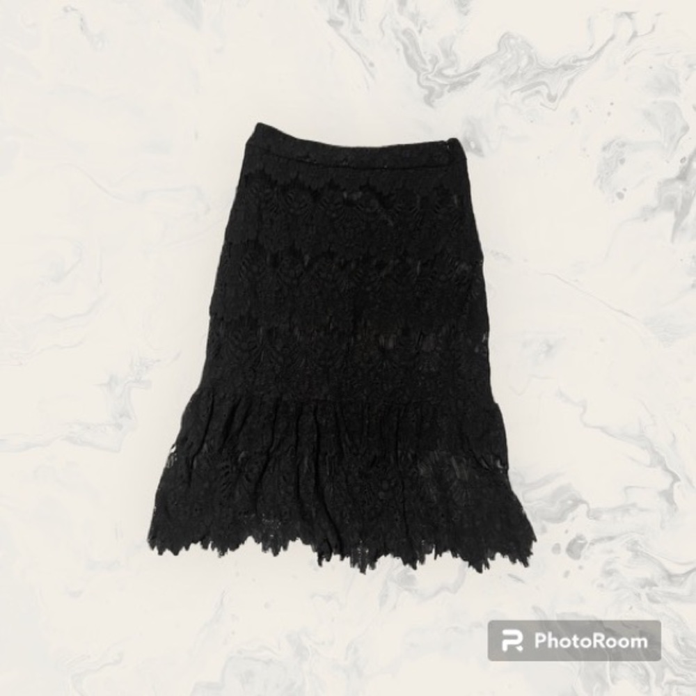 Dainty Jewell’s black lace midi skirt!